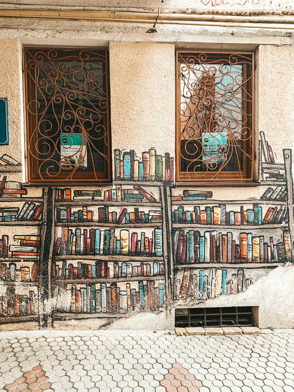 brown wooden book shelf with books