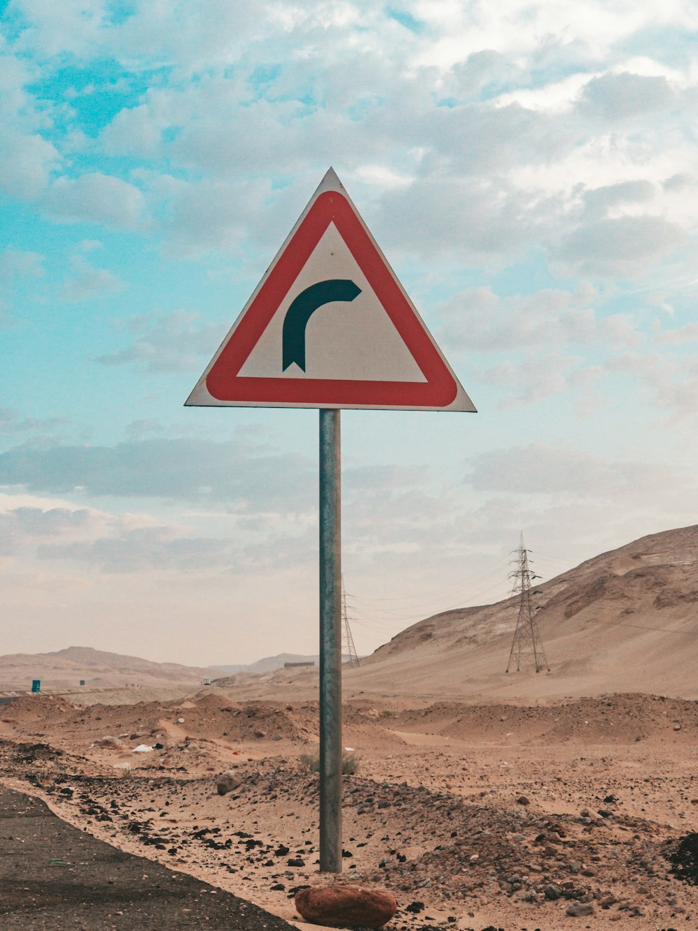 black and white arrow sign