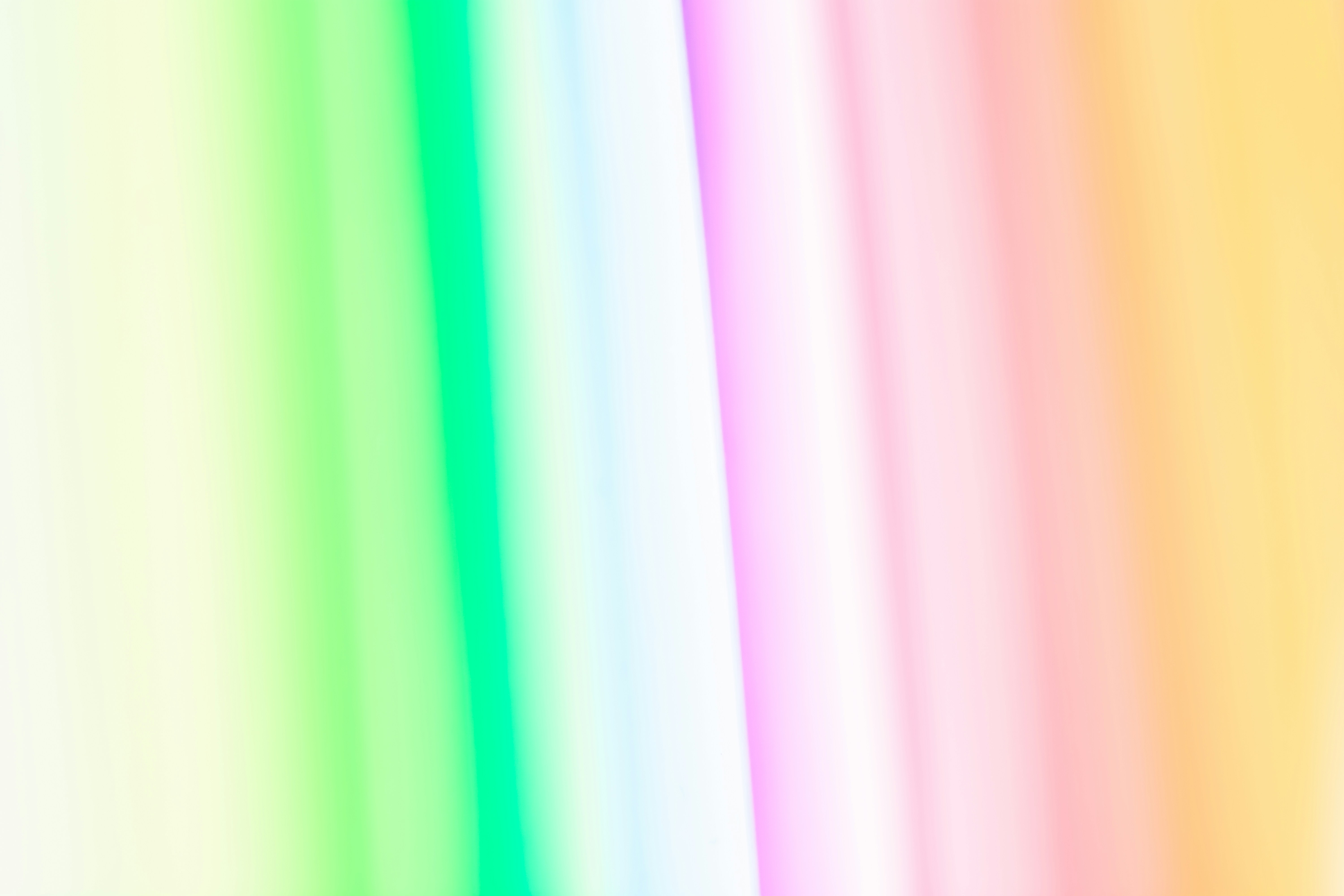 pink green and yellow textile