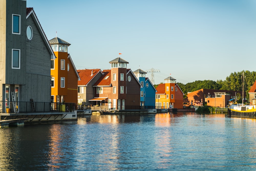 houses near body of water during daytime