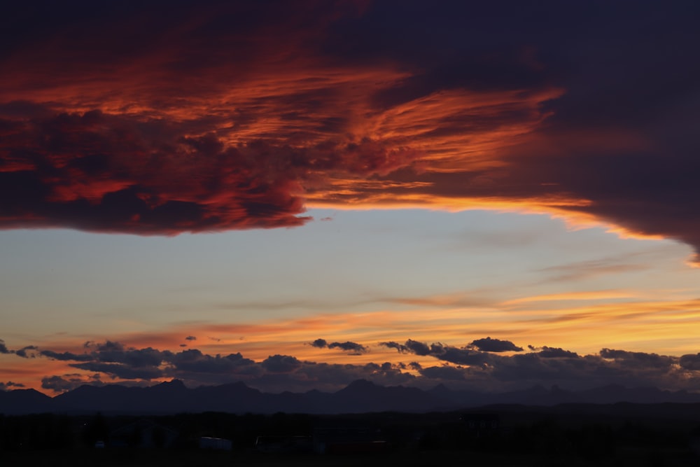 silhouette of mountains during sunset