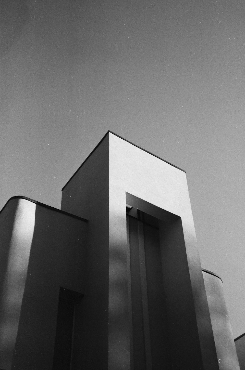 grayscale photo of concrete building