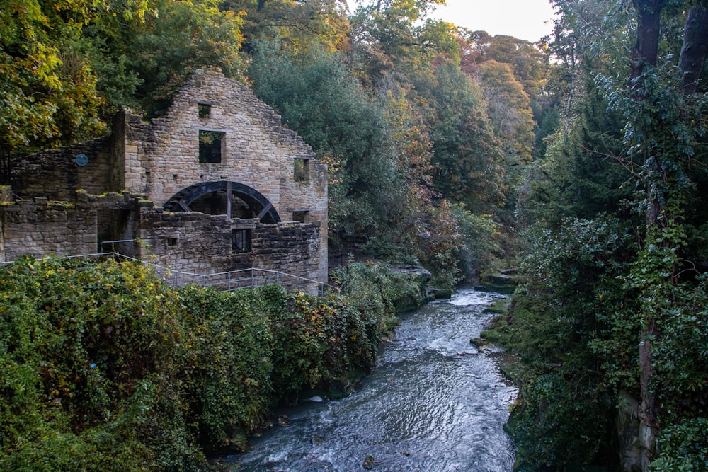 gray concrete building near river