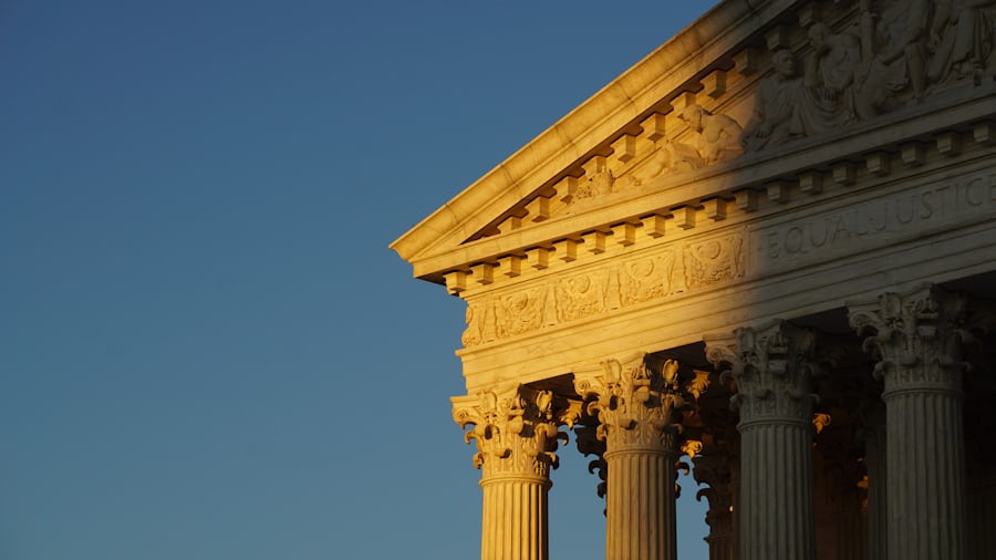 he front facade of the US Supreme Court in Washington, DC (Ian Hutchinson via Unsplash)