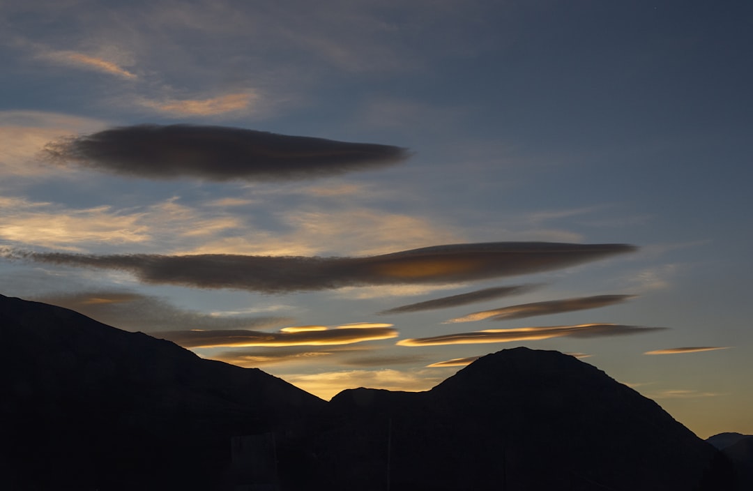silhouette of mountains during sunset, 