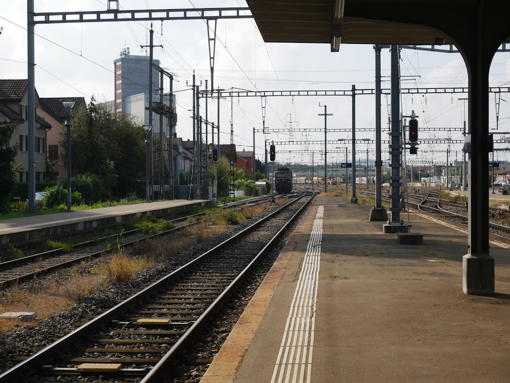 train rail tracks during daytime