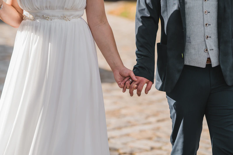 couple holding hands in a serious relationship
