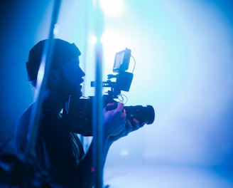 silhouette of person holding camera