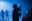 silhouette of man holding camera