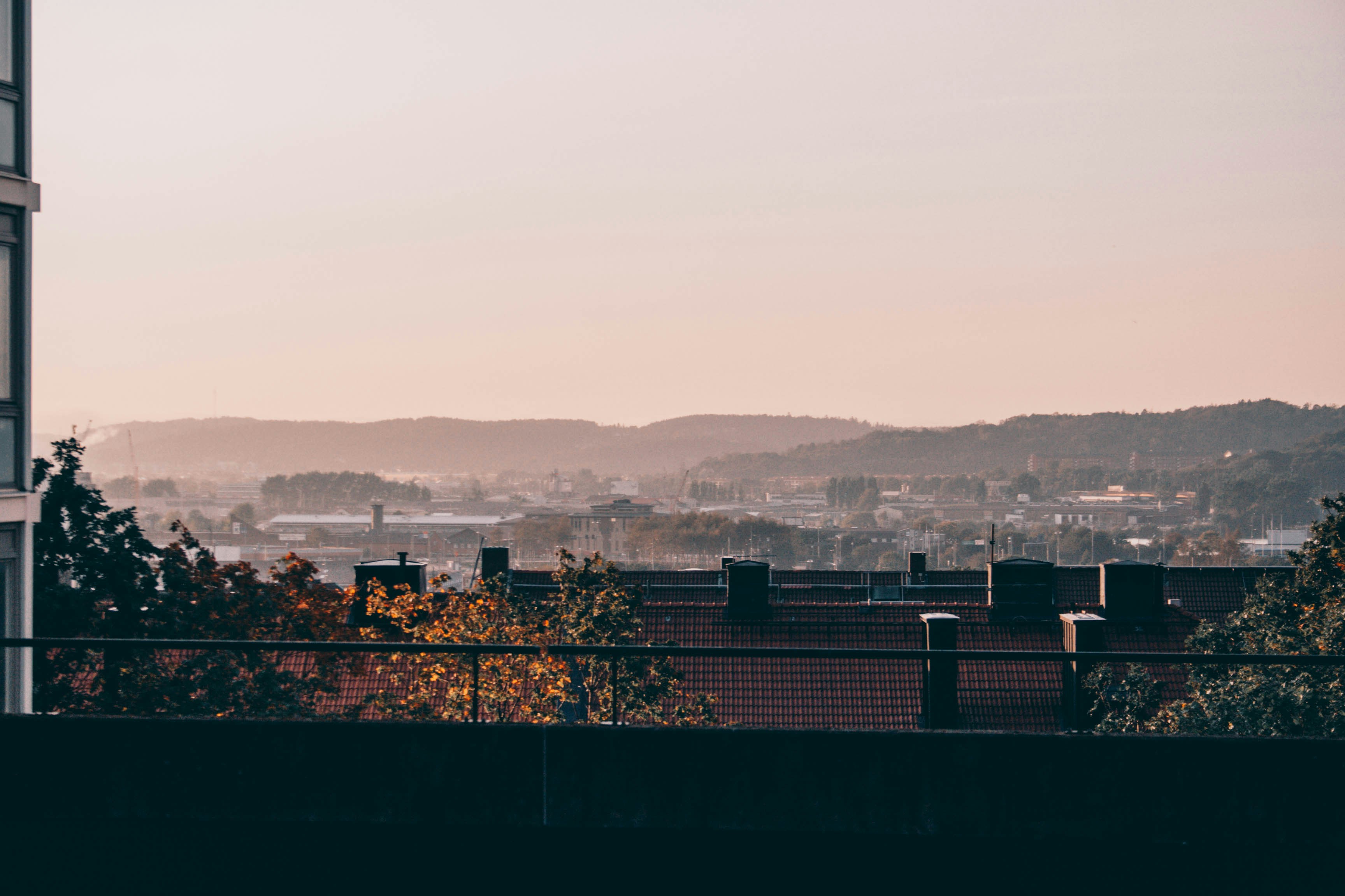 city skyline under white sky during daytime
