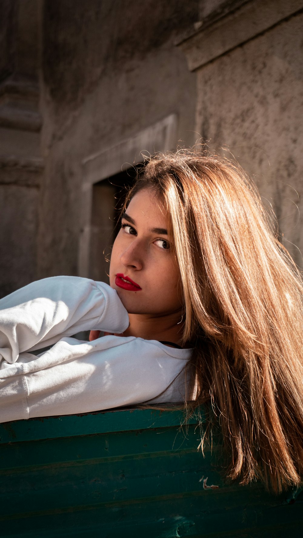 woman in white long sleeve shirt