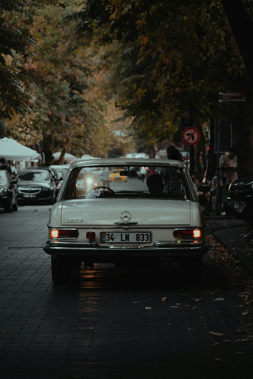 silver mercedes benz car on road during daytime