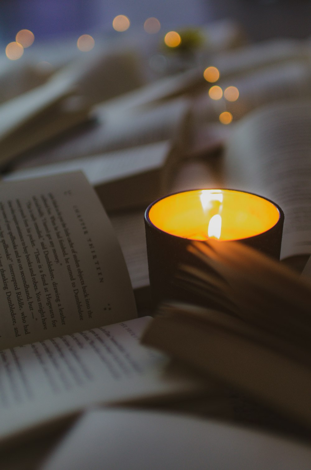 lighted candle on white printer paper