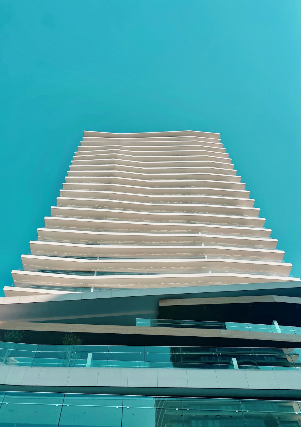 white concrete building under blue sky during daytime