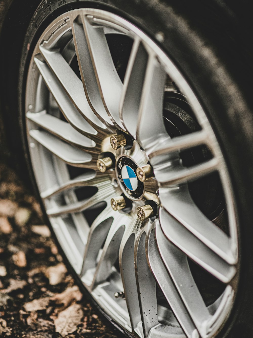 silver mercedes benz wheel with tire