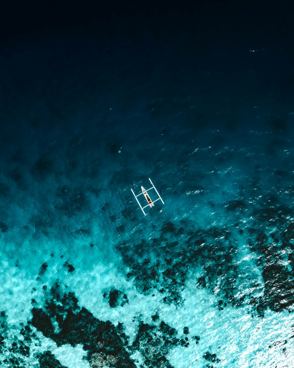 white and blue body of water