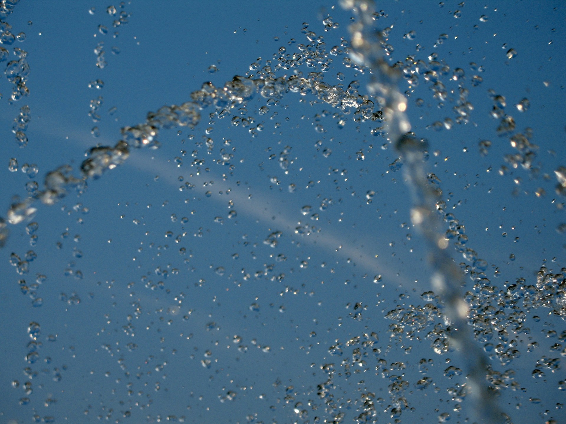 water droplets on glass during daytime