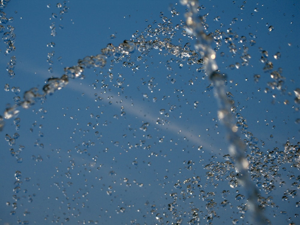 water droplets on glass during daytime