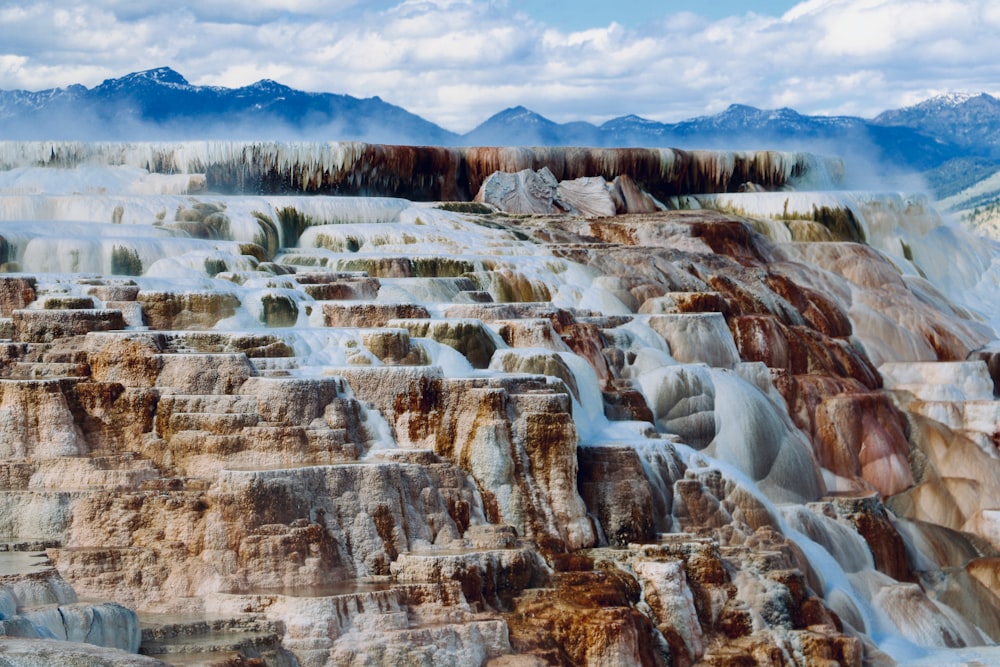 brown rocky mountain under blue sky during daytime