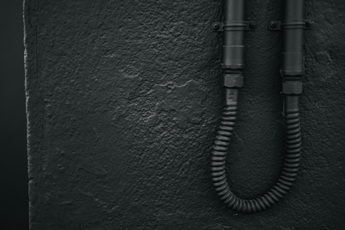 Installation of flexible conduits in a fast food restaurant kitchen highlighting durability