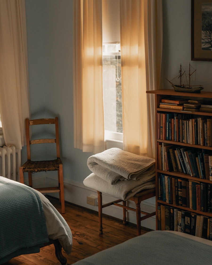 Warm bedroom with bookshelf and window light — Clay Banks on Unsplash