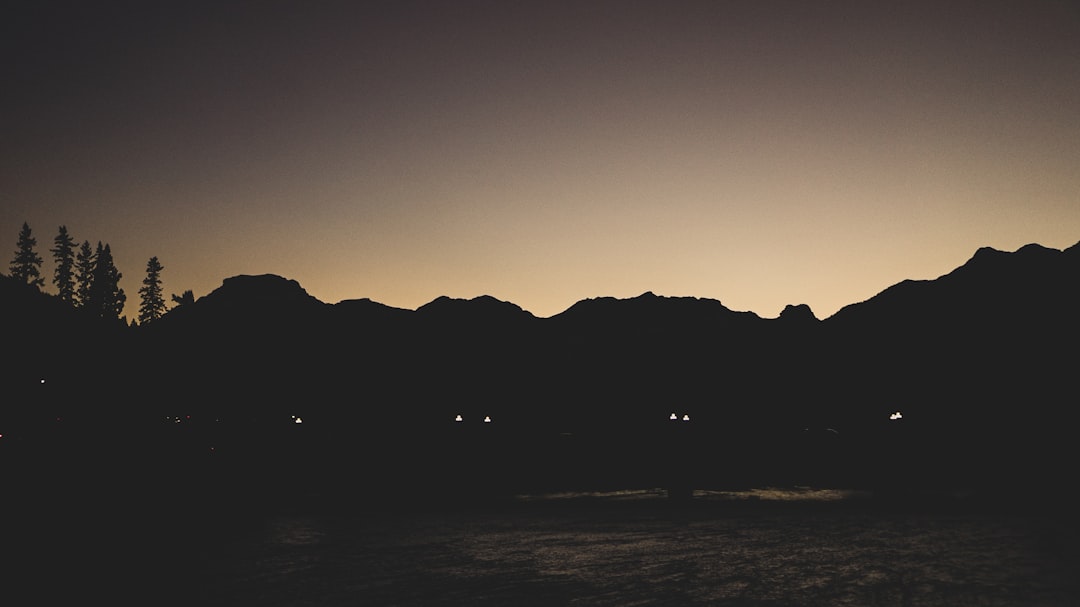 silhouette of mountain during sunset