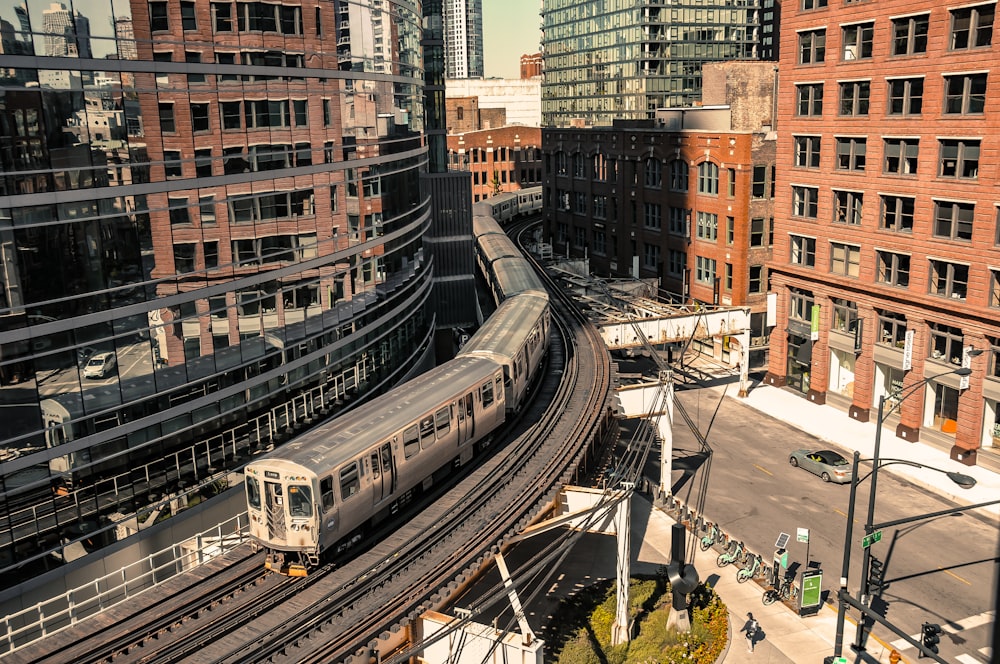 white and brown train on rail road during daytime