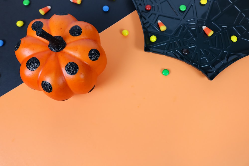 yellow plastic toy on white table