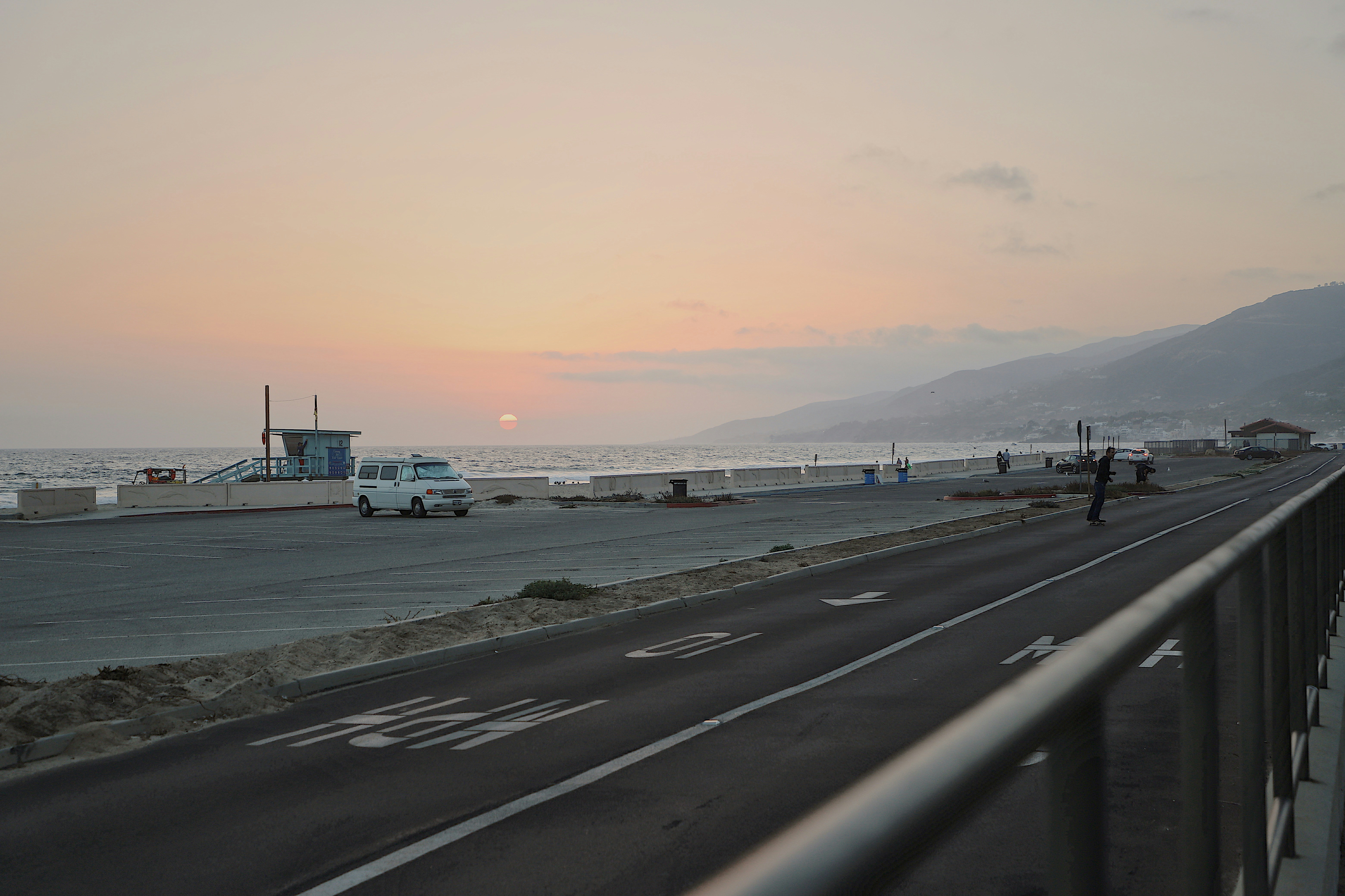 white ship on sea during daytime, Sunset in Malibu