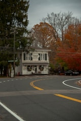 Cozy storefront of Donald Freeman General Store with welcoming entrance and local shoppers.