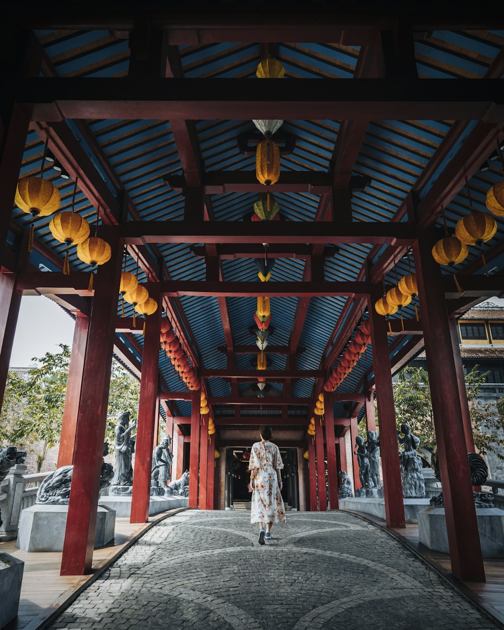 brown wooden roof with white and red floral carpet