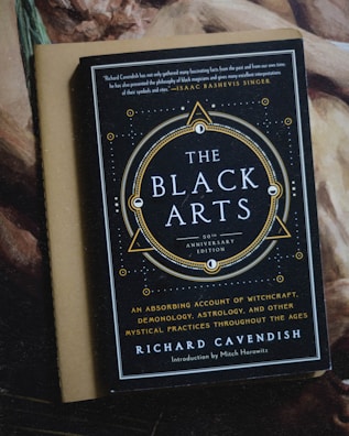 black and gold box on white textile
