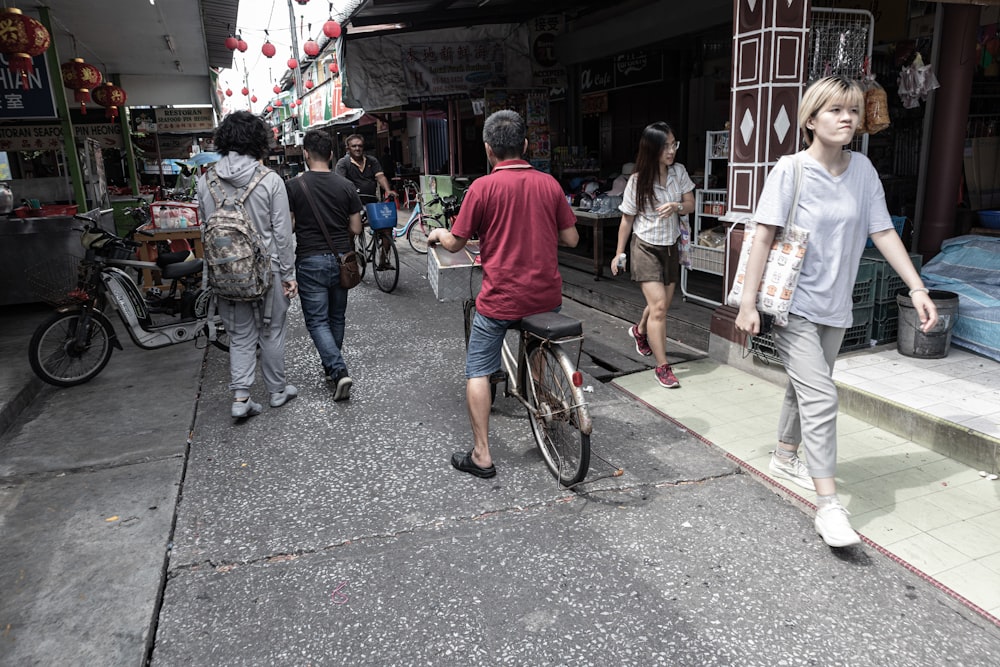 people walking on street during daytime