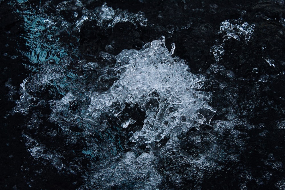 water splash on black surface