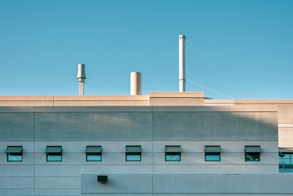 white concrete building under blue sky during daytime