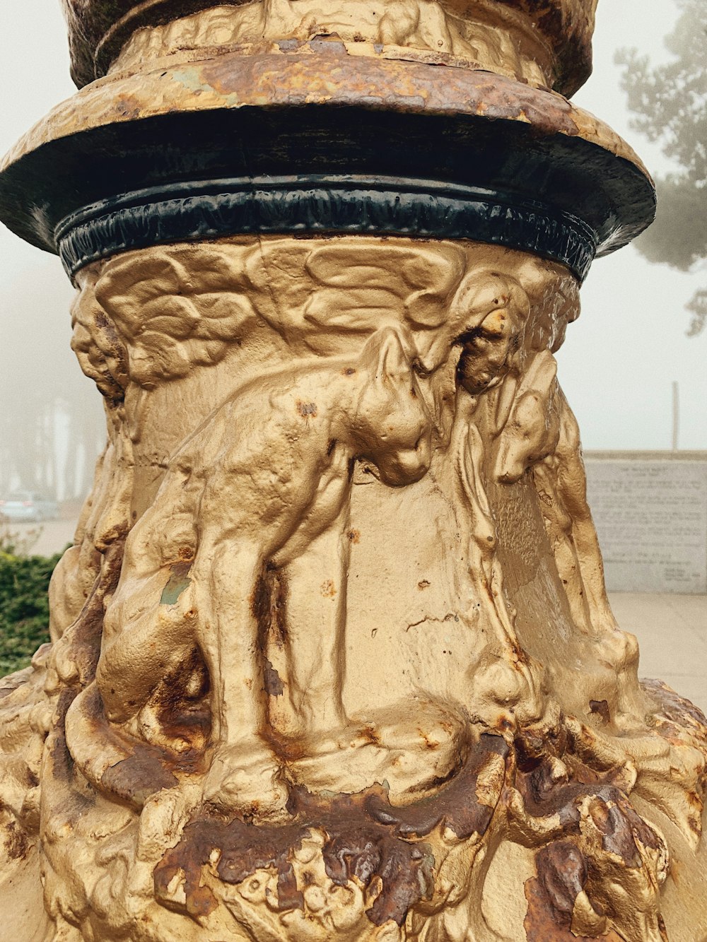 brown concrete statue during daytime