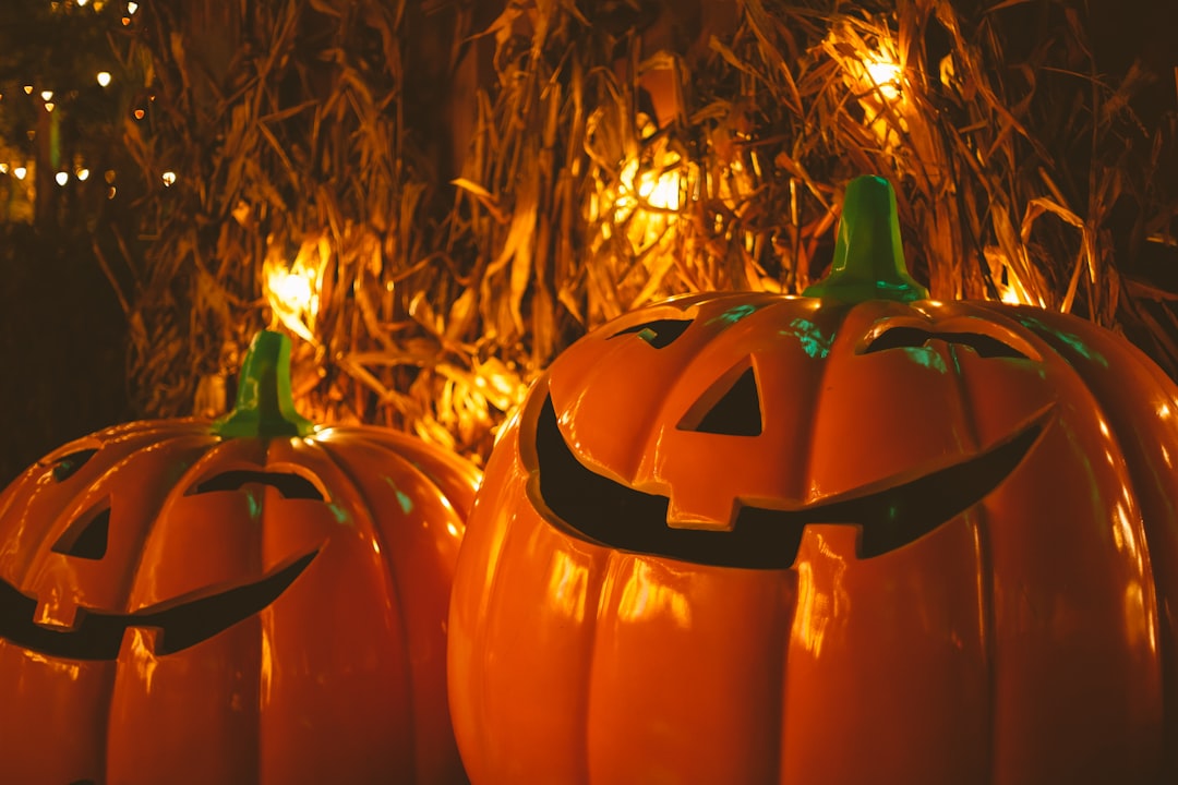 jack o lantern on brown wooden table,
