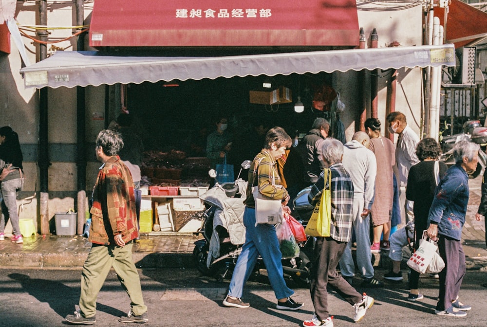 people walking on street during daytime