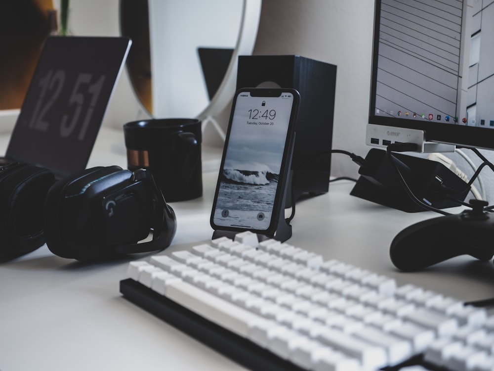 black samsung android smartphone on white table