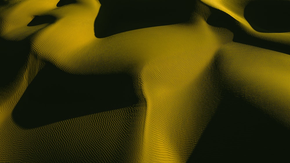 yellow textile on black textile