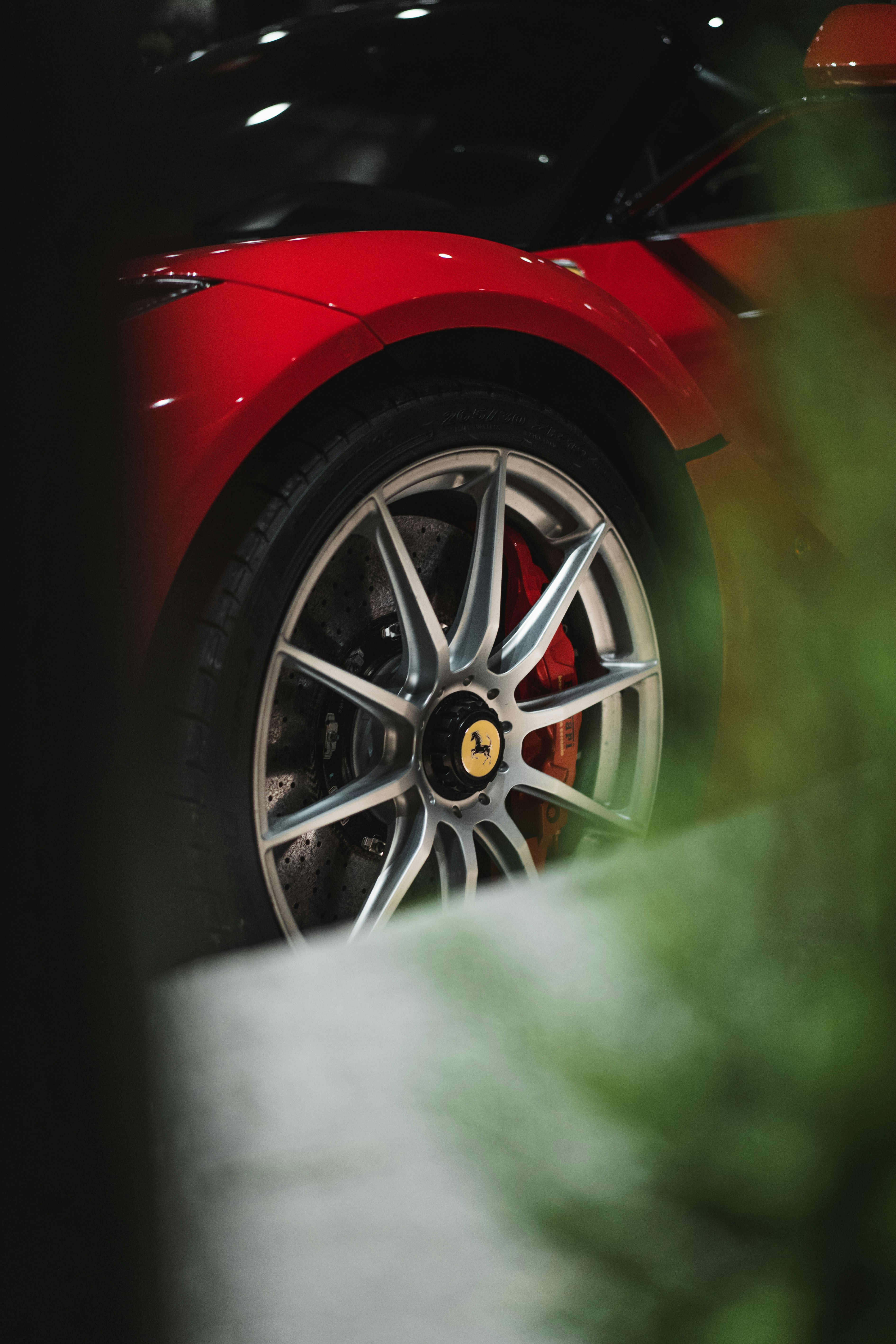 red car with gray wheel