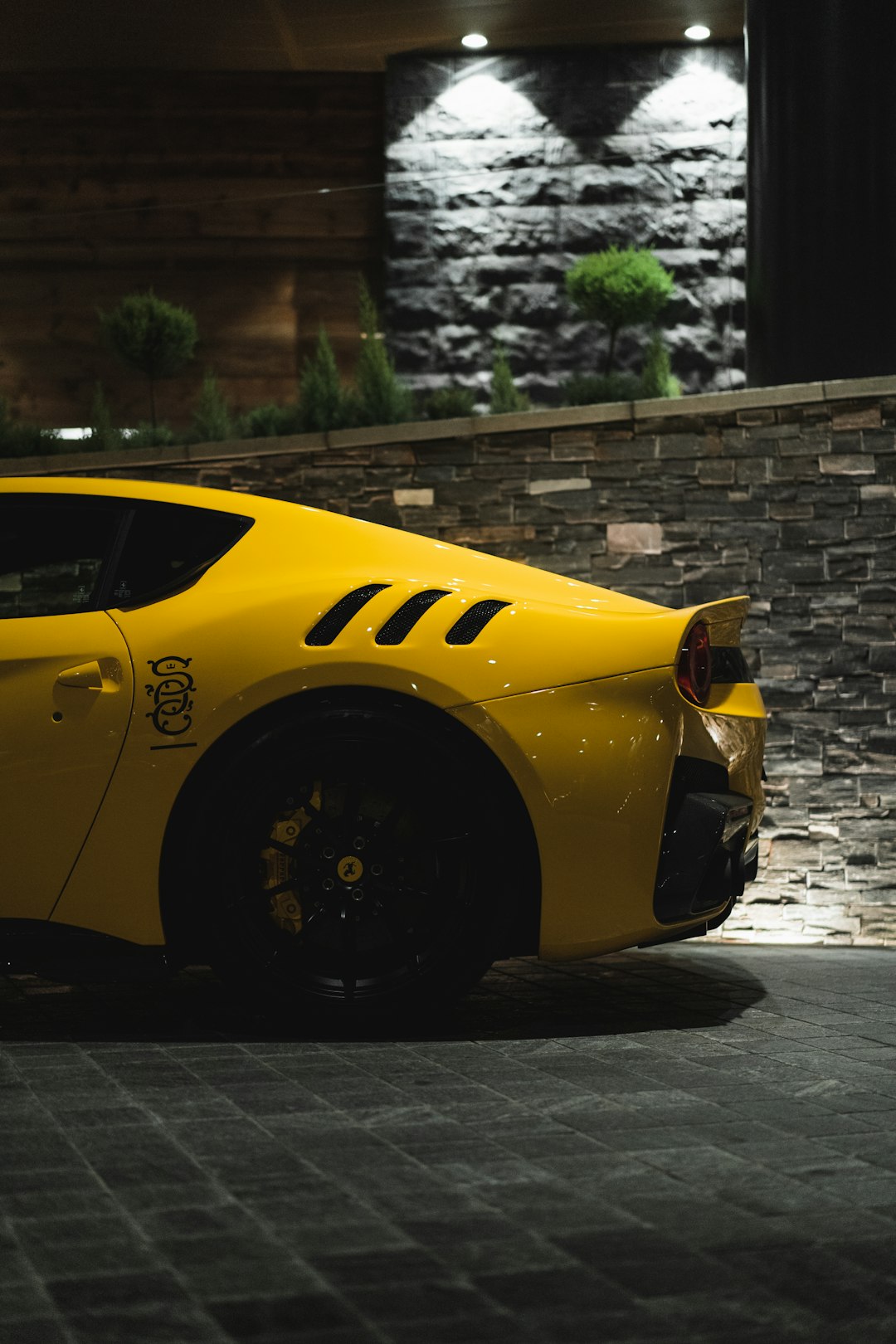 yellow lamborghini aventador parked on street during daytime