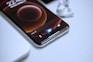 black android smartphone on white table