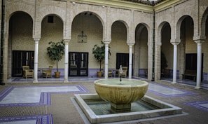 An outdoor space featuring elegant tile work and landscaping.