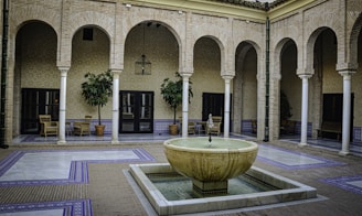 An outdoor space featuring elegant tile work and landscaping.