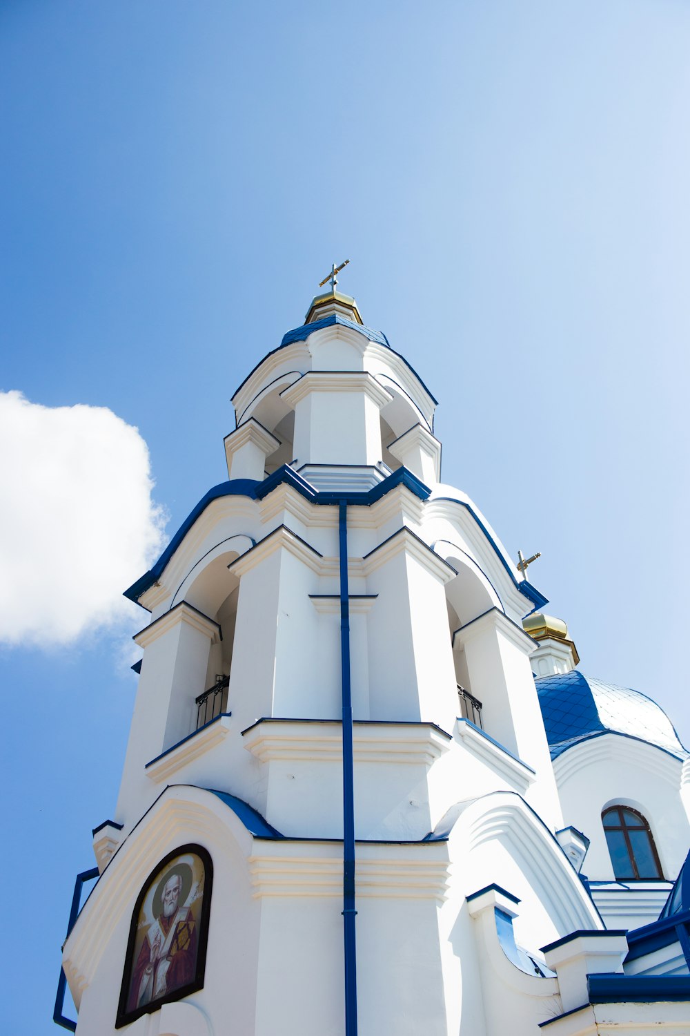 white concrete church under blue sky during daytime