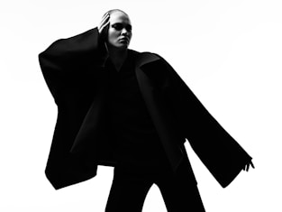 man in black suit jacket