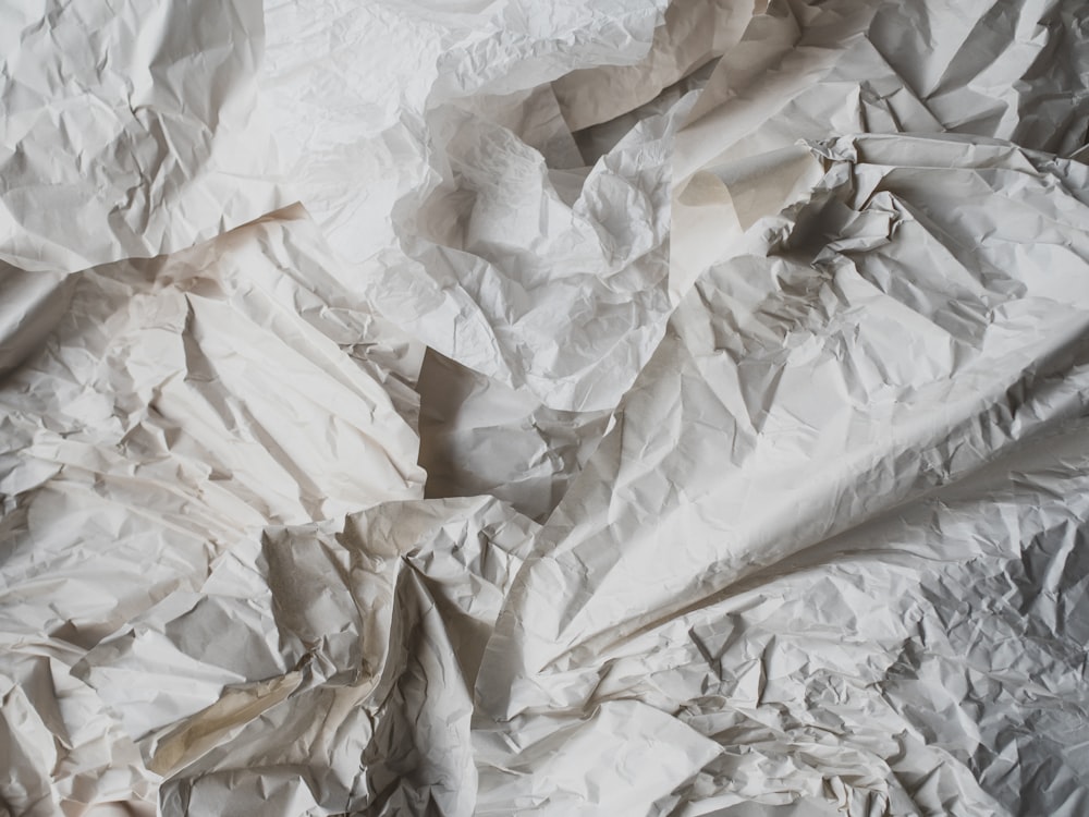 white and brown floral textile