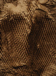 brown and black snake skin textile