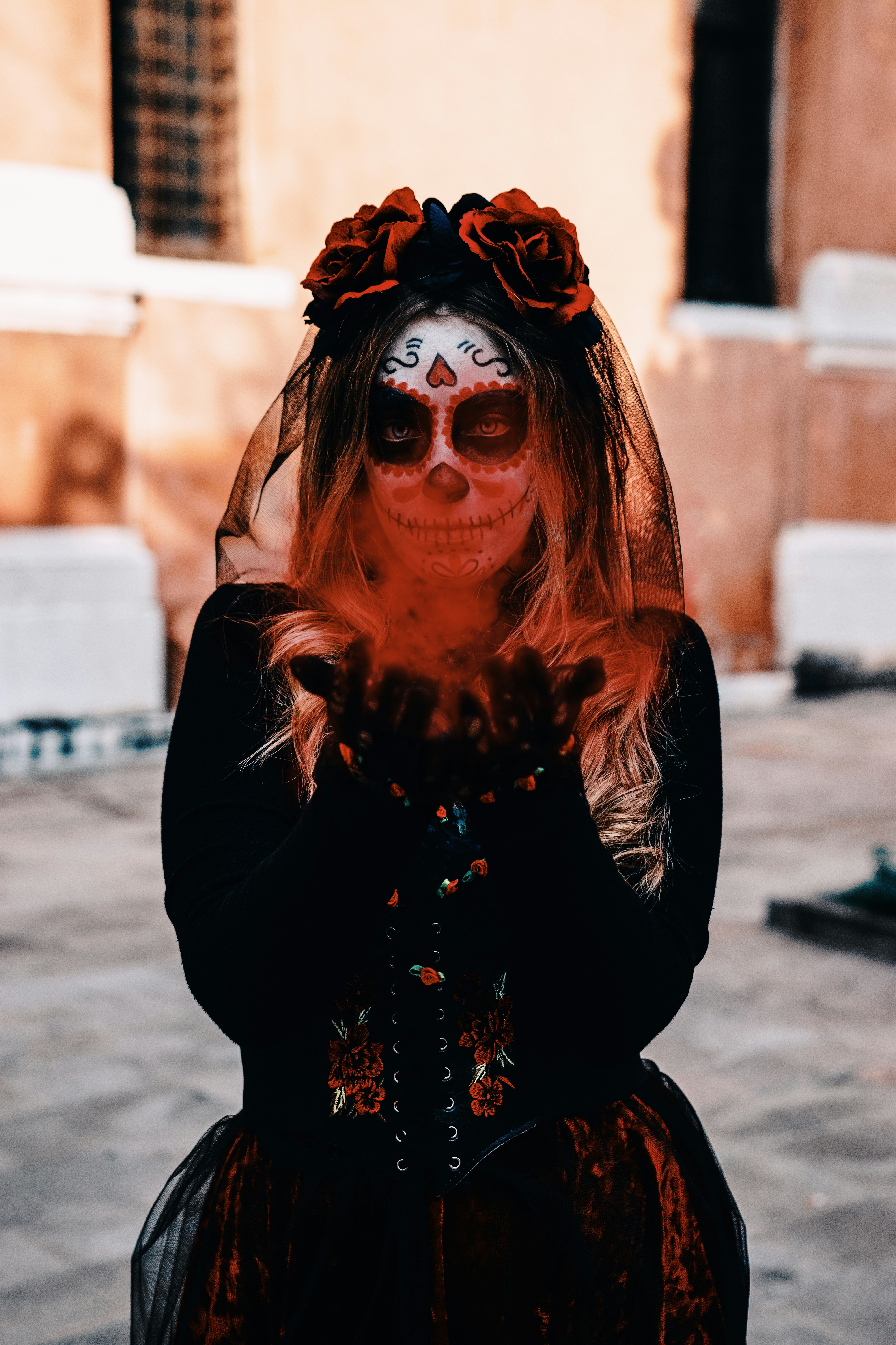 woman in black long sleeve shirt with red hair